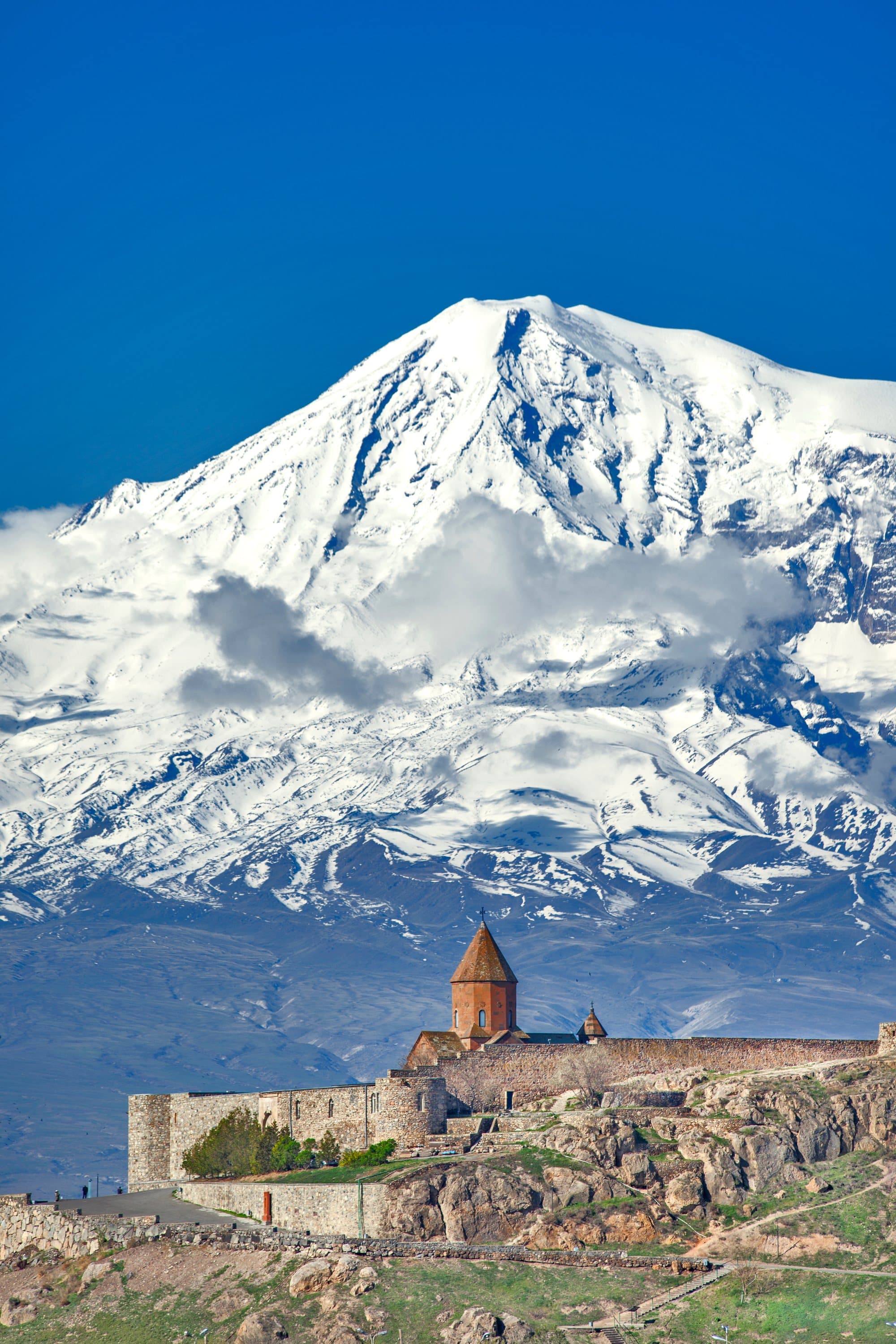 Khor Virap's walls and bell tower seen close, with Ararat rising behind