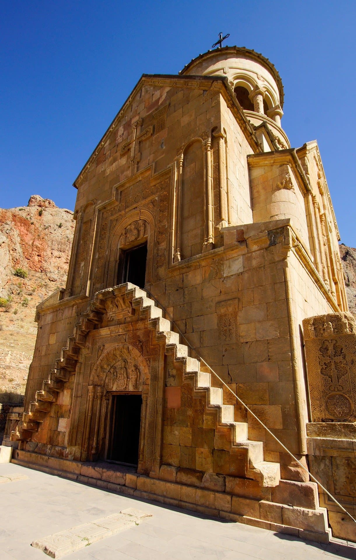 The narrow stone stair built out from the façade of Noravank’s two-storey church