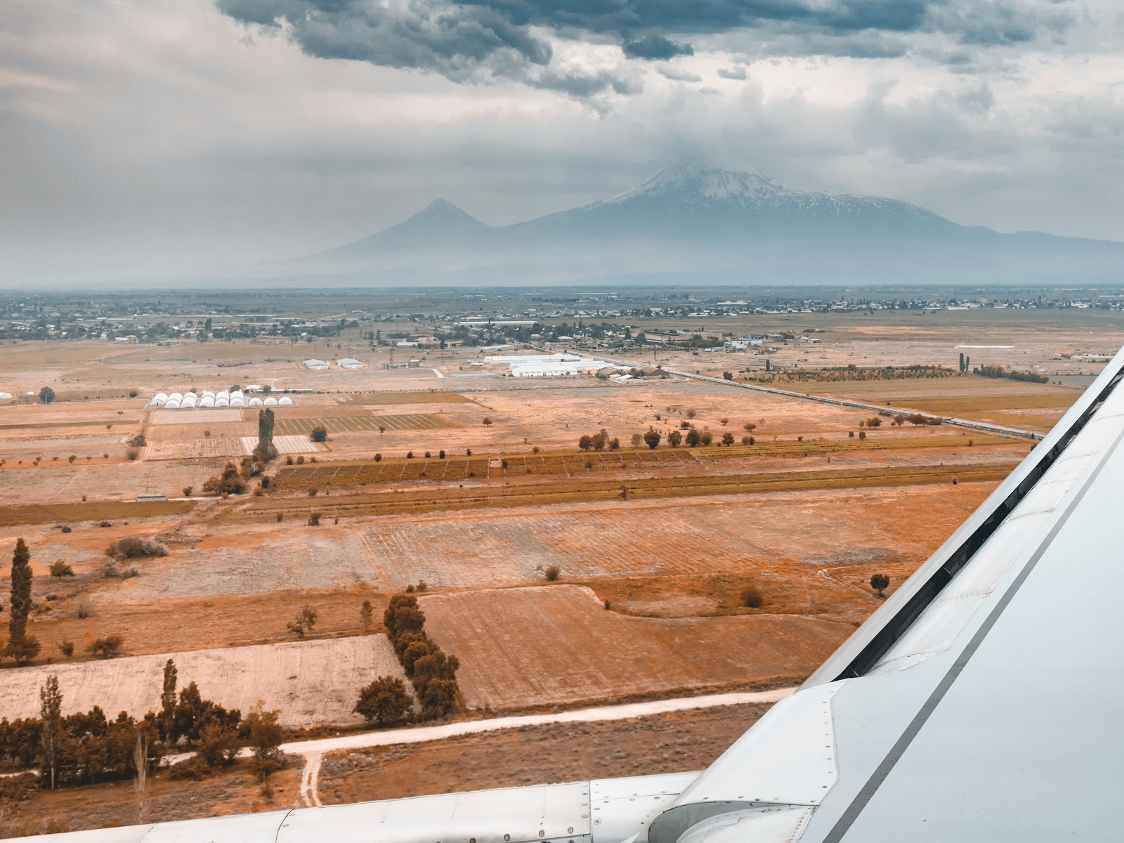 Both peaks of Ararat above the Ararat plain, seen from the window on the approach to Zvartnots